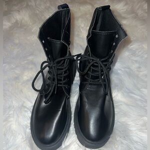 Brand new black combat boots